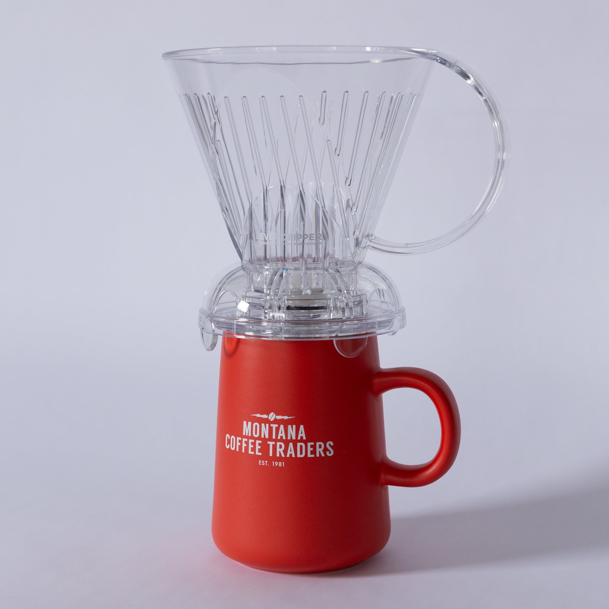 Coffee brewer set on top of a coffee mug